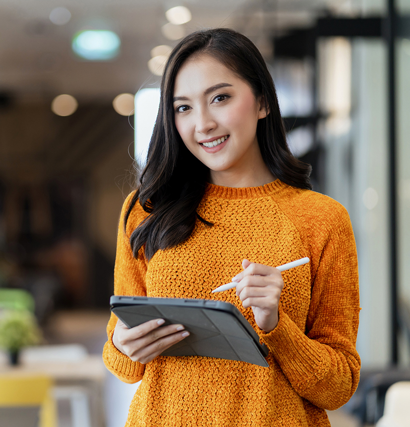smart confidence asian female startup entrepreneur small business owner businesswoman wear smart casual cloth smile hand use tablet woking inventory checking in showroom office daytime background